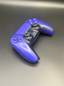 Left-front angled view of Galactic Purple PS5 DualSense unit PS5-GPR-001 showing the D-pad and left grip