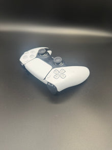 Right-front angled view of Glacier White PS5 DualSense unit PS5-WHT-HE-003 showing the face buttons and right grip