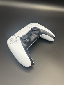 Left-front angled view of Glacier White PS5 DualSense unit PS5-WHT-HE-004 showing the D-pad and left grip