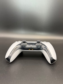 Bottom-edge view of Glacier White PS5 DualSense unit PS5-WHT-HE-001 showing the headset and accessory connections