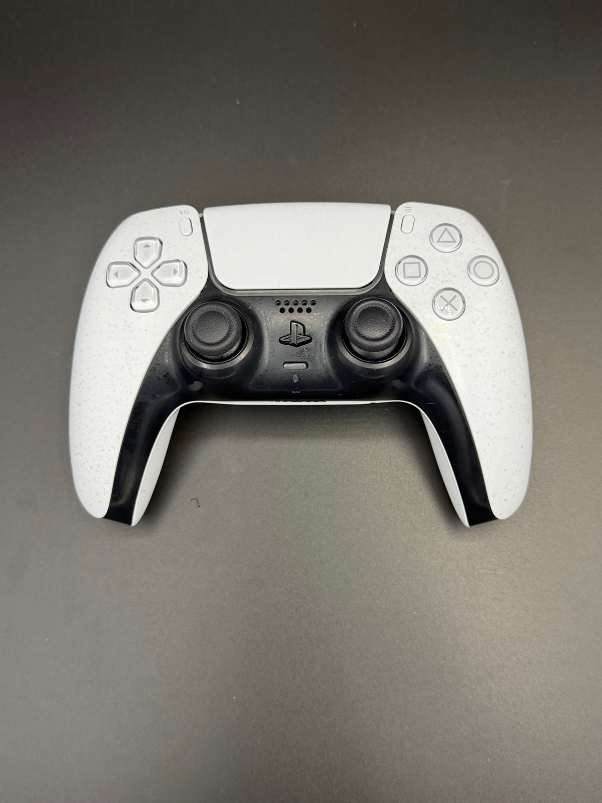 Front view of the exact Glacier White PS5 DualSense controller, unit PS5-WHT-HE-001