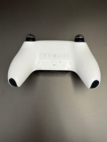 Rear view of Glacier White PS5 DualSense unit PS5-WHT-HE-001 showing the back shell and grips