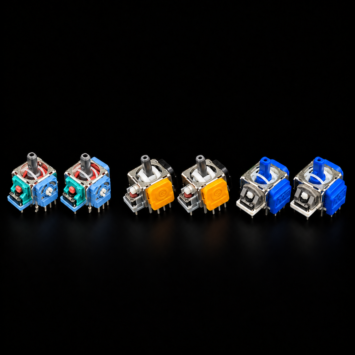 Hall Effect and TMR joystick modules beside an original potentiometer joystick module